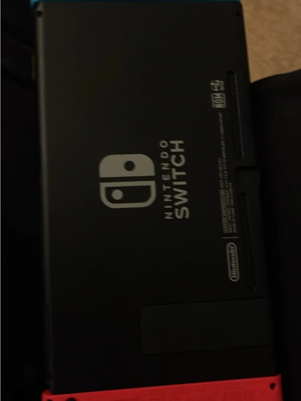 Nintendo Tablet with Neon Red and Neon Blue Joy‑Con Controllers